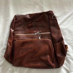 New brown leather backpack